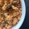 Cous cous rosso con olive taggiasche e tonno